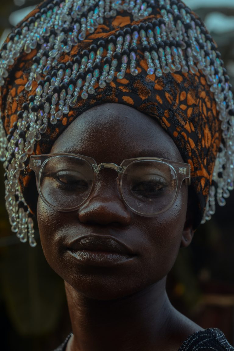 Older lady wearing glasses after receiving an eye check up at Msimbazi Eyes & Vision Care in Dar es salaam