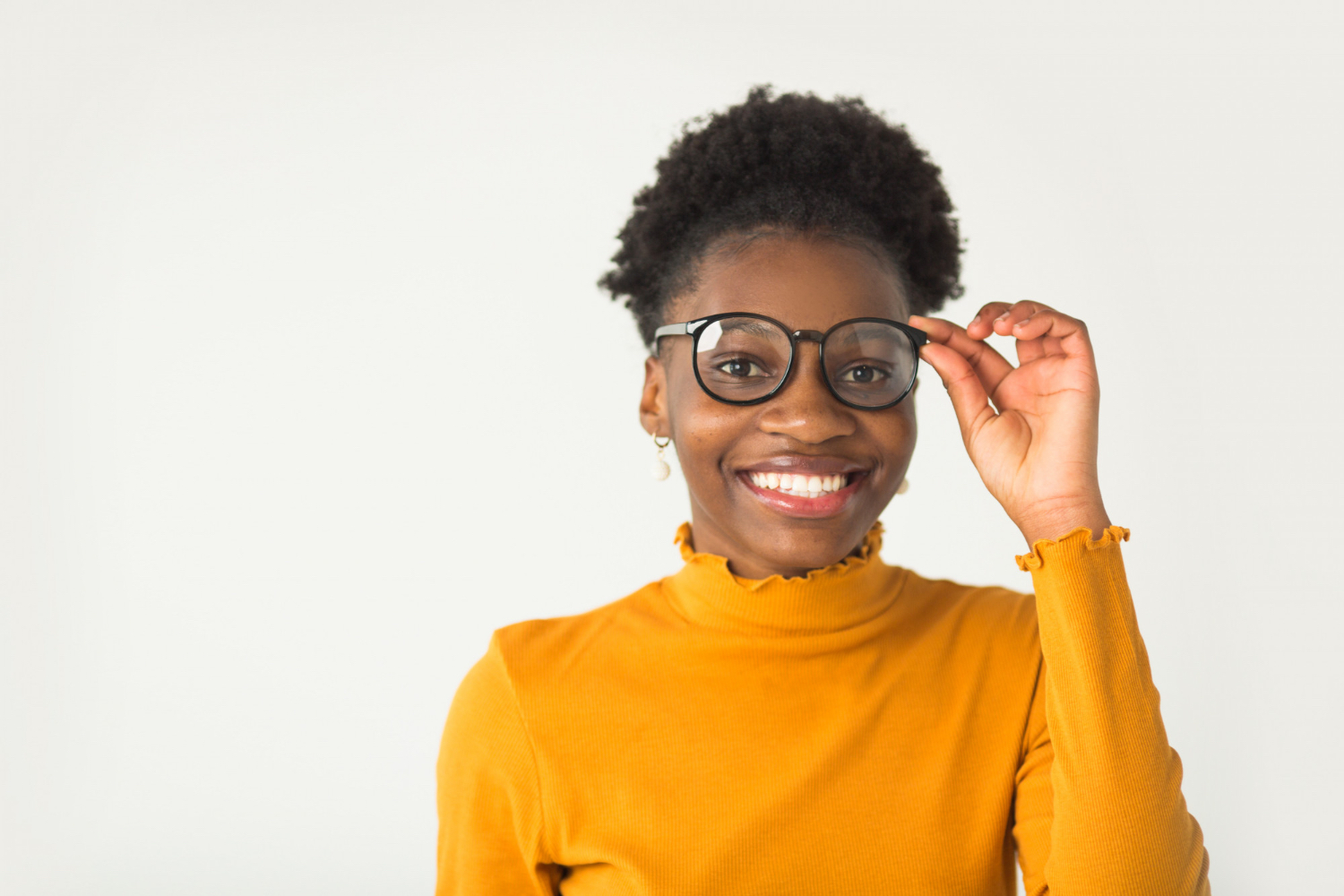 Woman wearing stylish non-designer eyeglasses in Dar es Salaam, showcasing affordable and high-quality eyewear for everyday use at Msimbazi Eyes & Vision Care.